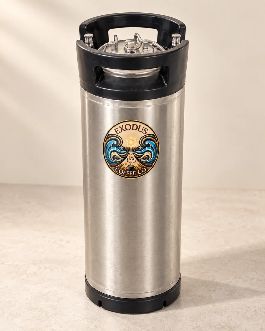 A stainless steel 5-gallon Exodus Coffee Co. cold brew keg with the Exodus logo on the side